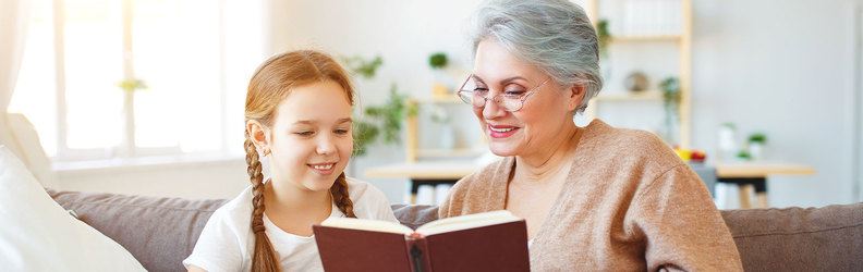 Adult and child reading